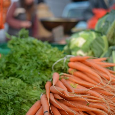 Fresh carrots for sale at a farmers market
