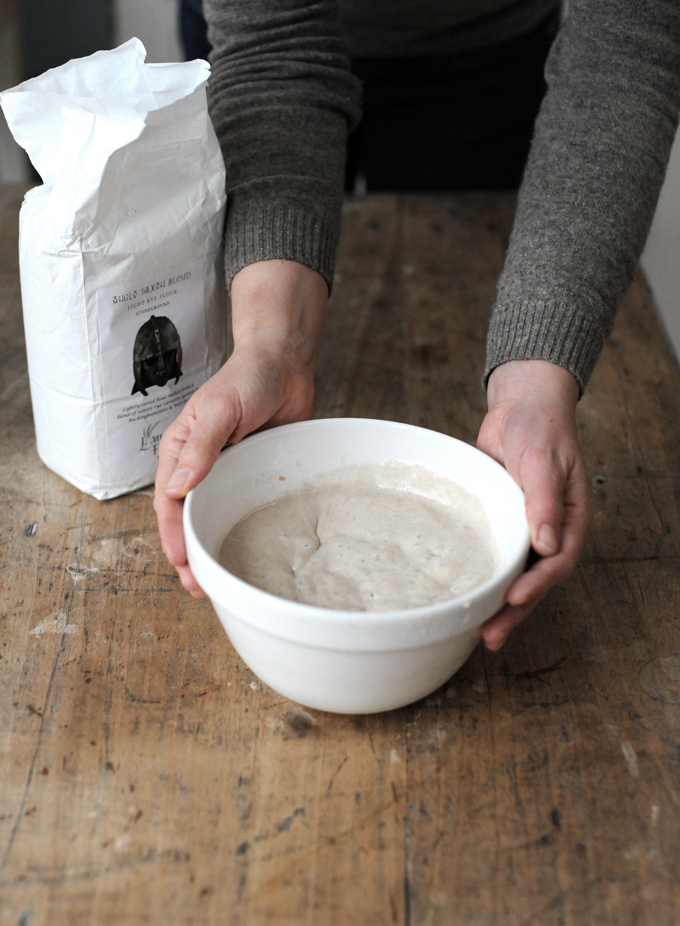 Add the levain and the scalded flour mix together. Stir in the water, and the rye flour. Mix, then cover and leave on the side unit the following morning - the next morning it ill be wonderfully bubbly. 