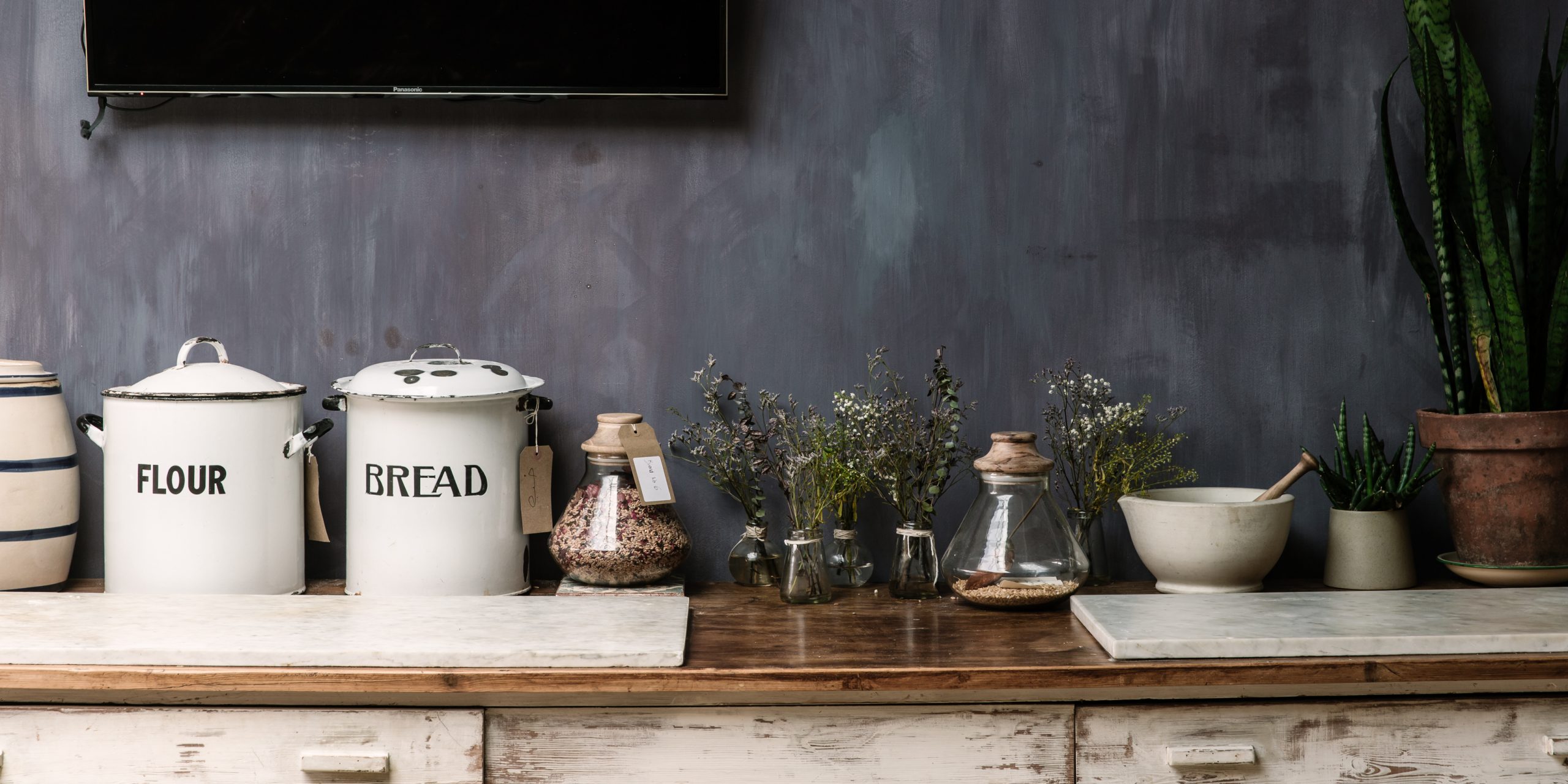 the sourdough sc cool workbench with botanical blends on glass jars