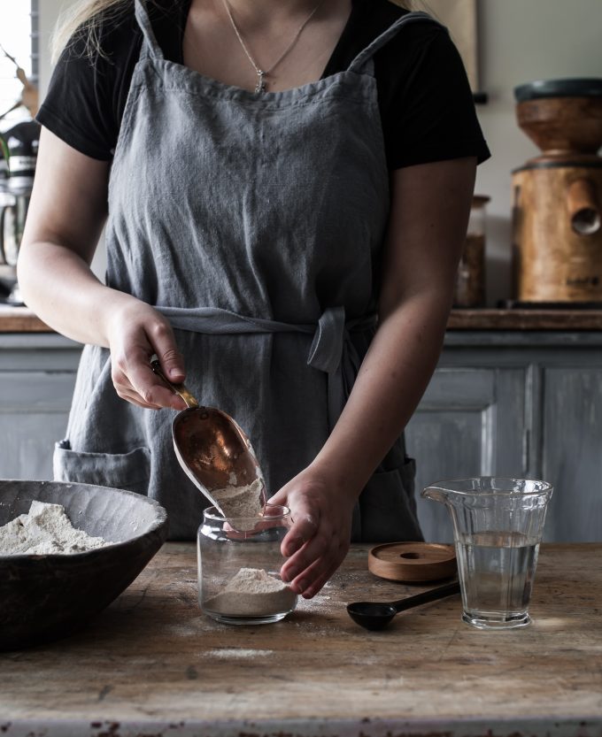 freshening a sourdough starter showing sourdough starter ratios
