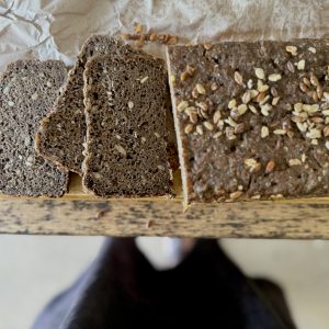 Proven healthier Bread in the world on the table showing the diversity and clout and sliced to see crumb structure