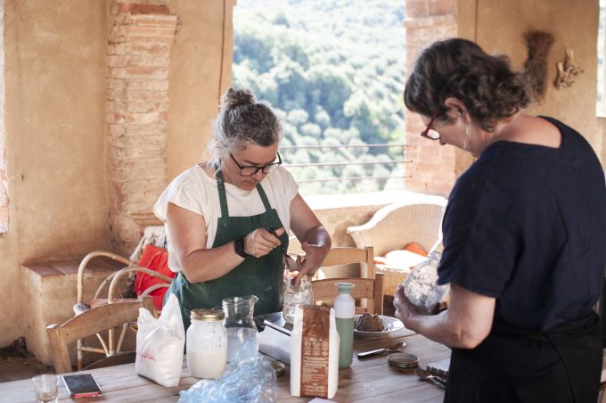 A hands-on sourdough bread baking course for students at our luxury Tuscany retreat, focusing on traditional fermentation techniques in an authentic Italian castle setting.