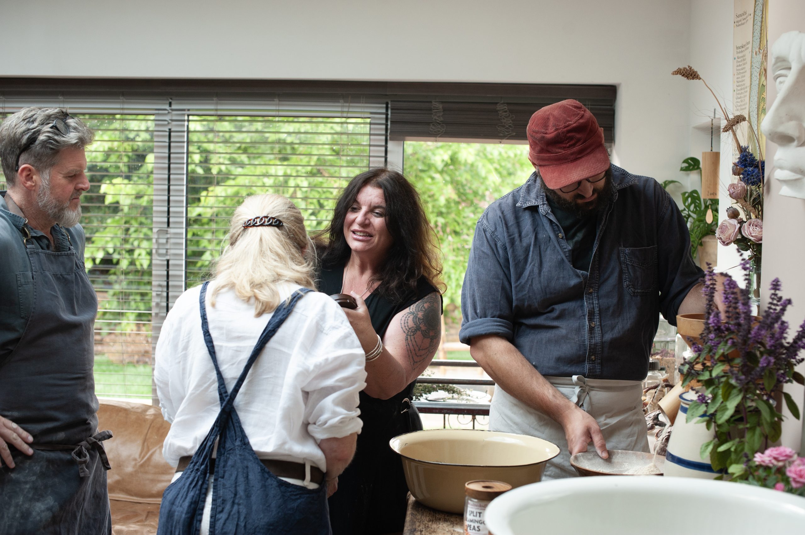 VANESSA WITH STUDENTS MILLING FLOUR
